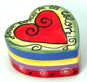 hearr-shaped trinket box, says Love comes in all colors.