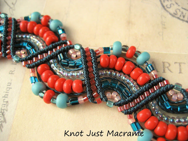 Bracelet knotted in teal, turqoise, marina blue and coral waves pattern
