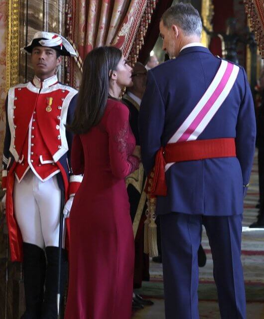 Queen Letizia is wearing a red embroidered long dress by Felipe Varela, at Pascua Militar ceremony as a tradition