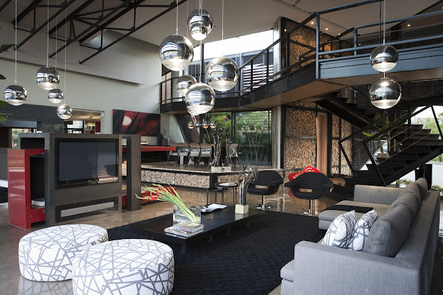 Living room with dining room and staircase 