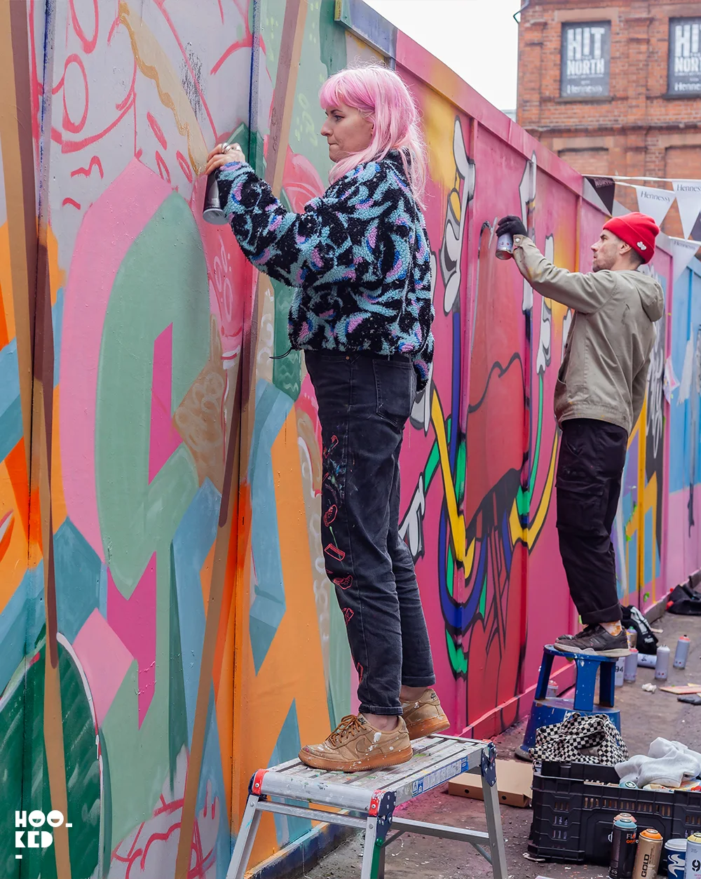 Belfast Street Art mural for Hit The North festival, artist Zippy at work