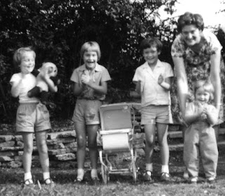 Black-and-white family photo from the 1960s: my mother and her four children.