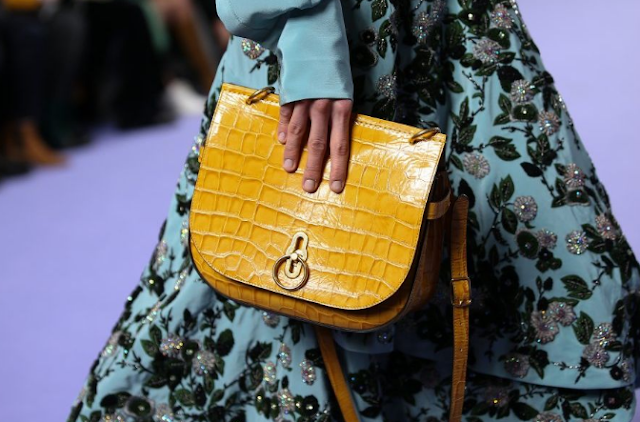 Mulberry swings to misfortune on intense UK retail market and House of Fraser breakdown