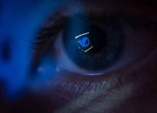 The logo of Chinese AI start-up DeepSeek is displayed on a computer screen, reflected in the pupil of an IT student. Photo by Frank Rumpenhorst/Getty Images.