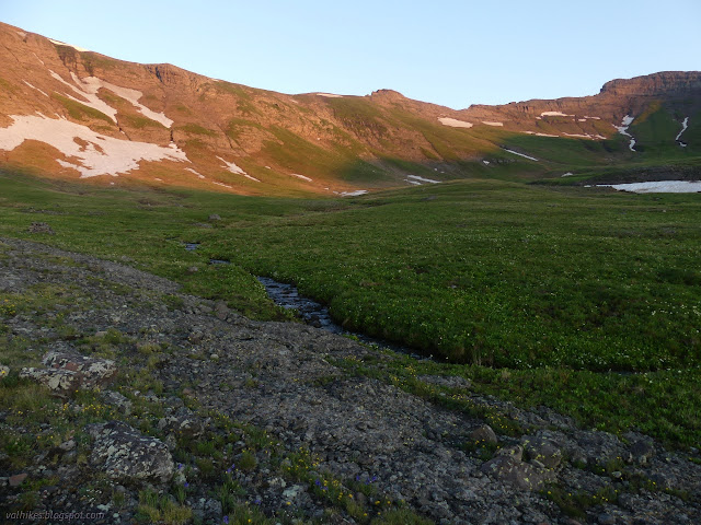 100: sunny mountains, shaded creek