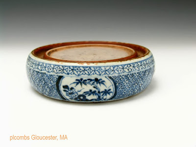 <img src="Chinese Transitional Period ink stone .jpg" alt="blue and white porcelain lattice decorations">