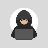 Illustration of hooded figure - a thief - typing on a laptop.