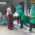 Persit Koramil Pungging Bagikan Sembako & Masker