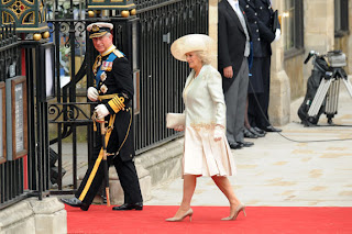 Camilla, the Duchess of Cornwall, (R), and Britain's Prince Charles (L) arrive at the West Door of Westminster Abbey