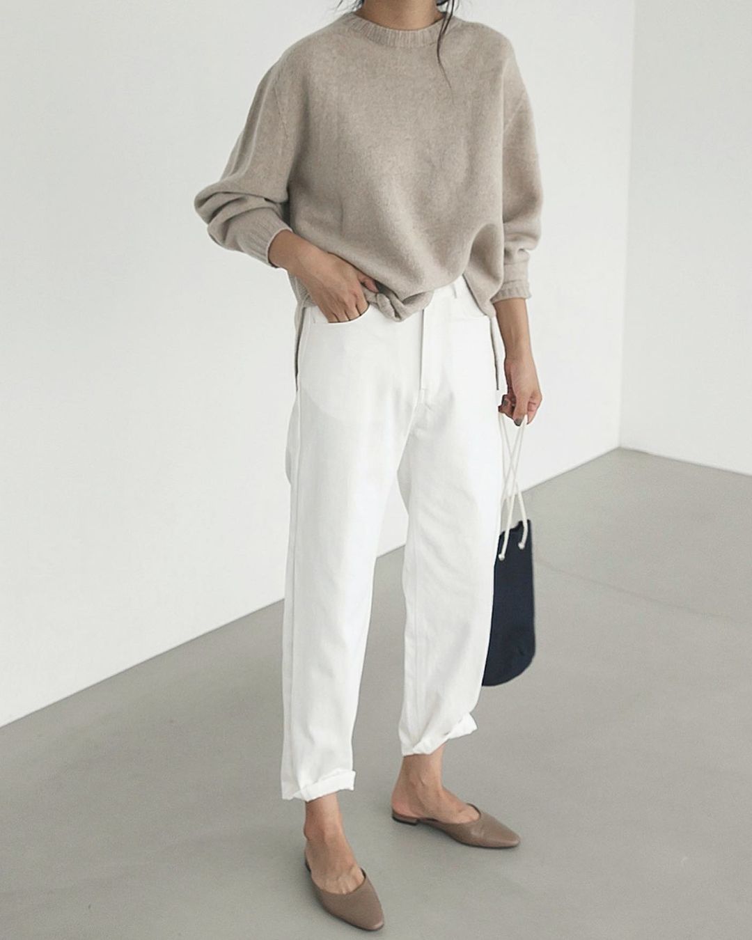 Stylish Fall Outfit Idea with Neutrals — Deathbyelocution Instagram Style with Beige Sweater, White Jeans, and Taupe Mule Flats