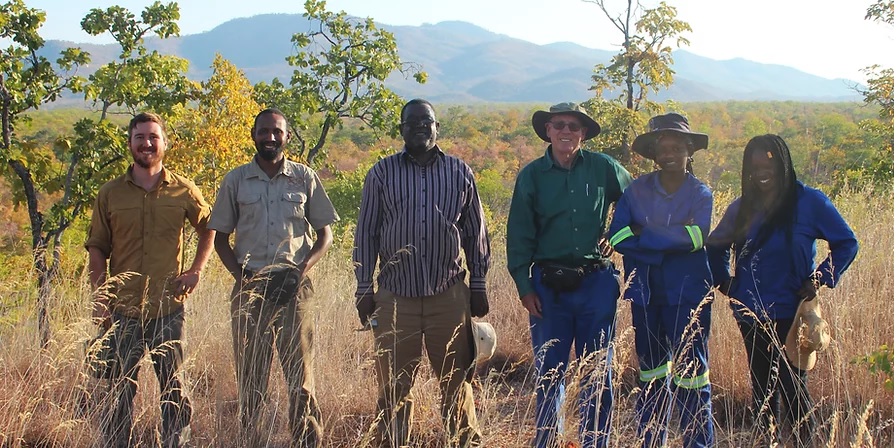 Christopher T. Griffin (left) and the team in Mbire, Zimbabwe