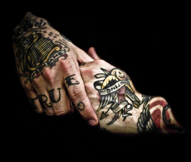 Tattoos on the hands of City and Colour and Alexisonfire vocalist Dallas 