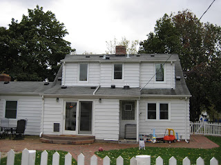 The back of the house has a large shed dormer.