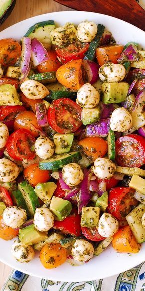 Avocado Salad with Tomatoes, Mozzarella, Cucumber, Red Onions, and Basil Pesto