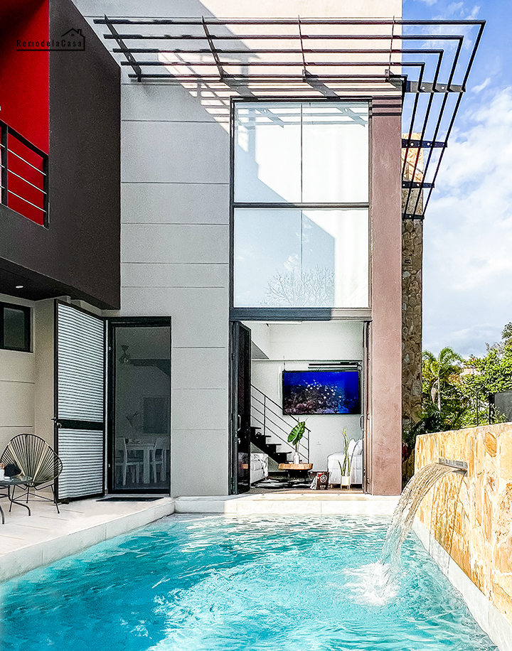 A modern three-story home with swimming pool