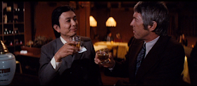 James Hong and James Coburn in The Carey Treatment (1972)