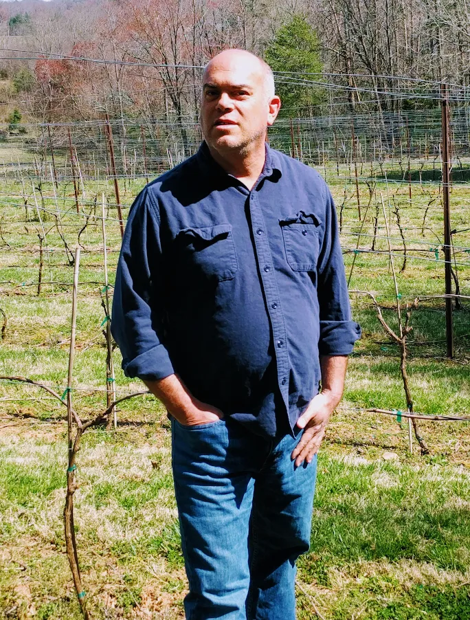 Sean McRitchie in the vineyard