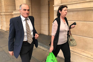 PHOTO: James Salerno (left) leaving court in Adelaide. (ABC News)