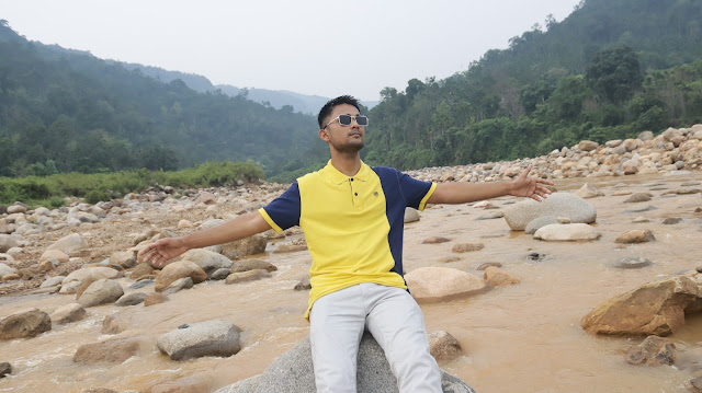 behind me giant stones spreading at Rangpani Jaintapur