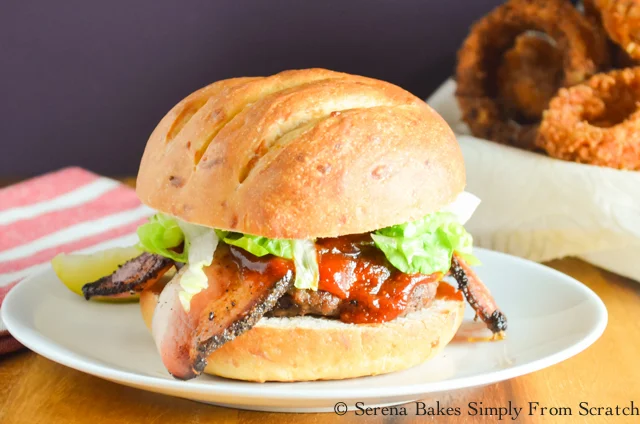 Whiskey Burgers, a heart beef patty, topped with bacon, and a homemade whiskey barbecue sauce. serenabakessimplyfromscratch.com