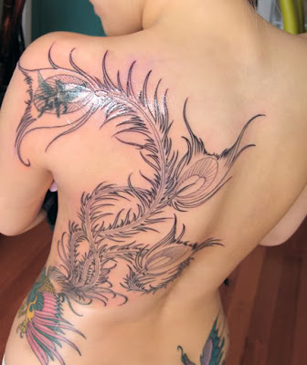 Source url:http://www.rasatattoo.com/dragon-tattoo-on-back.html 