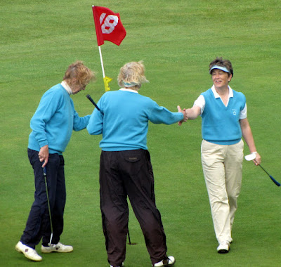 Alex Glennie on the 18th Green - Click to enlarge