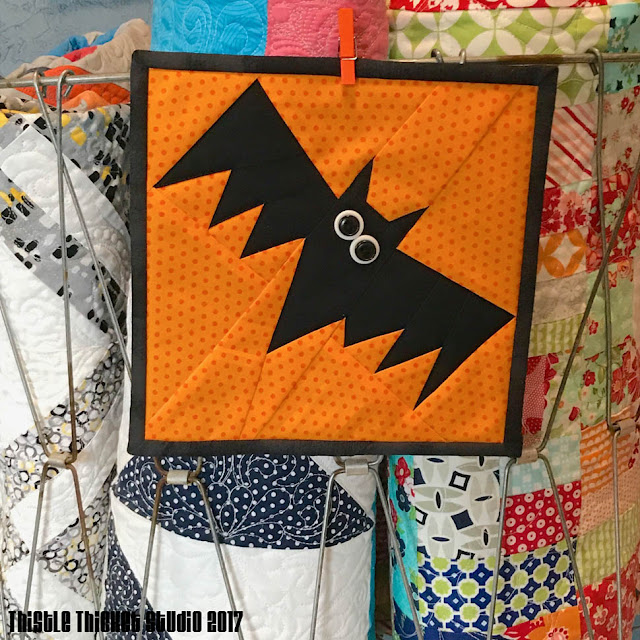 Halloween Bat Mini Quilt Made By Thistle Thicket Studio. www.thistlethicketstudio.com