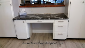 Eclectic Red Barn: black granite counter tops installed at desk