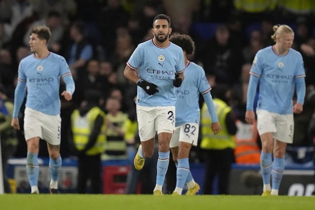 Selebrasi Riyad Mahrez dalam laga Premier League 2022/2023 Chelsea vs Manchester City, Jumat (6/1/2023) (c) AP Photo/Kirsty Wigglesworth