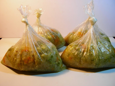Cooked vegetables in packets ready for storage