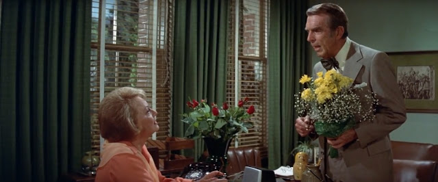 Fred MacMurray proposes to Olivia de Haviland. I don't
know why this is here, but at least the actors are good.