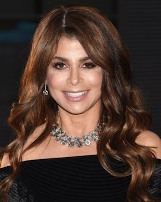 Paula Abdul color photo in a black dress