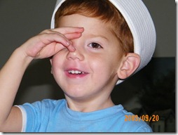 Camden, saluting (with a low grade fever and not feeling very good)Camden, saluting (with a low grade fever and not feeling very good)