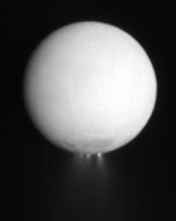 Cassini's view of Enceladus highlights geysers spewing ice from the southern hemisphere