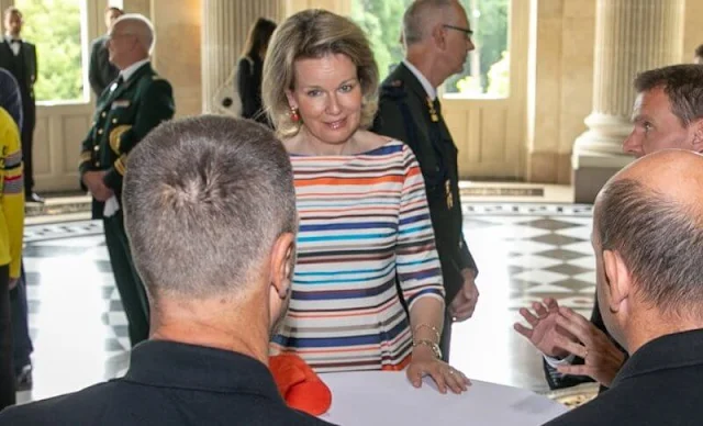 Queen Mathilde wore multicolored dress from Natan. King Philippe and Queen Mathilde held a reception for Paralympic athletes