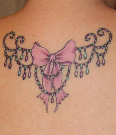bow tattoo on ankle. pink ow tattoos.
