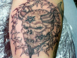 Demonic face thing demon tattoo