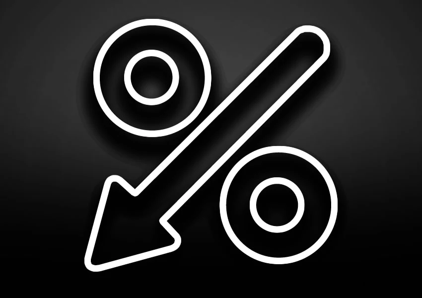A imagem mostra o símbolo de percentagem formando uma seta para baixo demonstrando que os juros do rotativo foram reduzidos