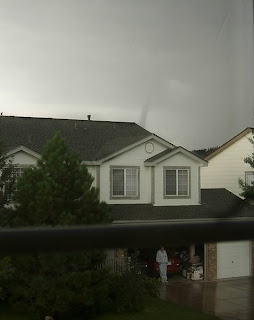 Click for Larger Image of Fading Tornado and Man Watching Storm