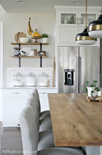 Open wood shelves in kitchen 