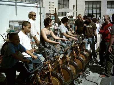 Humans creating energy on stationary bicycle generators at Humboldt State University