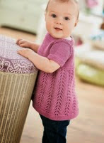 http://www.letsknit.co.uk/free-knitting-patterns/LK69-girls-pinafore-dress-Menzies