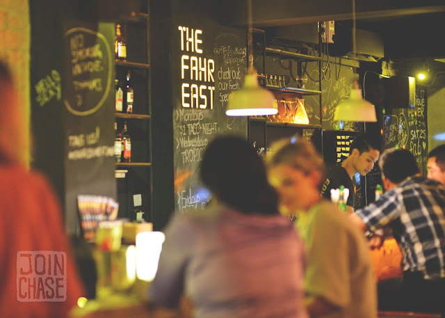 A bartender at Fahrenheit Cafe and Bar in Yangon, Myanmar, serves guests.