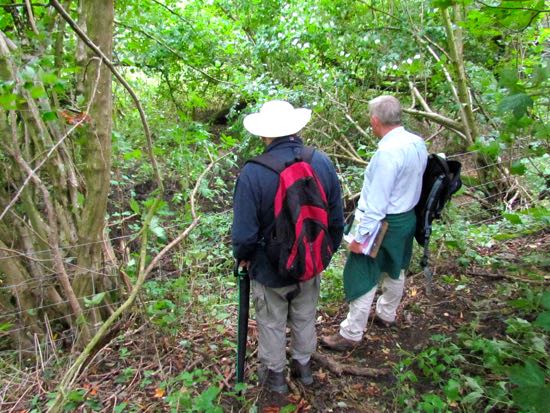 Mike Howgate (left) surveying swallow holes at point 5