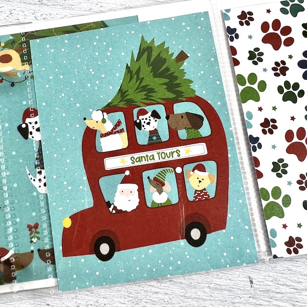 Christmas Dog Scrapbook Album Page with red bus, Santa Clause & Christmas tree