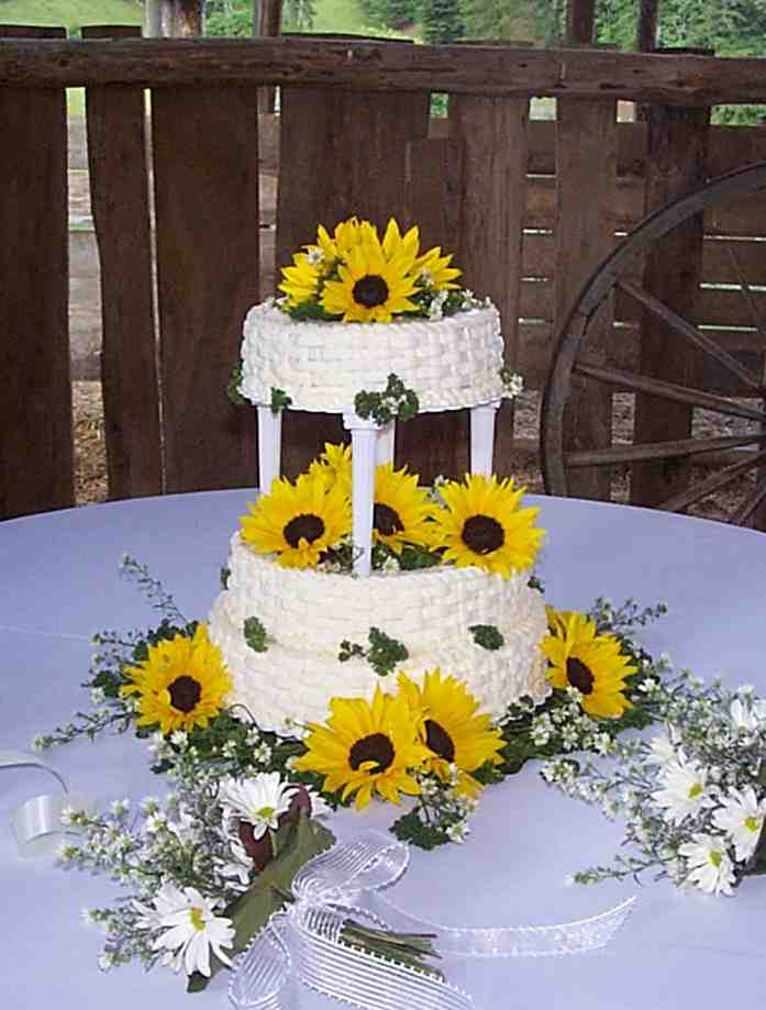 Lattice textured wedding cake with sunflowers