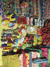 Sew Delightful dresses and toys donations for Operation Christmas Child shoeboxes.