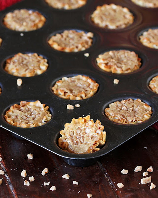 Baked Mini Coffee-Toffee Crunch Cheesecakes in Pan Image