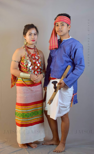 A couple wearing Kalai traditional dresses and attires