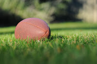 Game ball on the ground  Photo by Ben Hershey on Unsplash